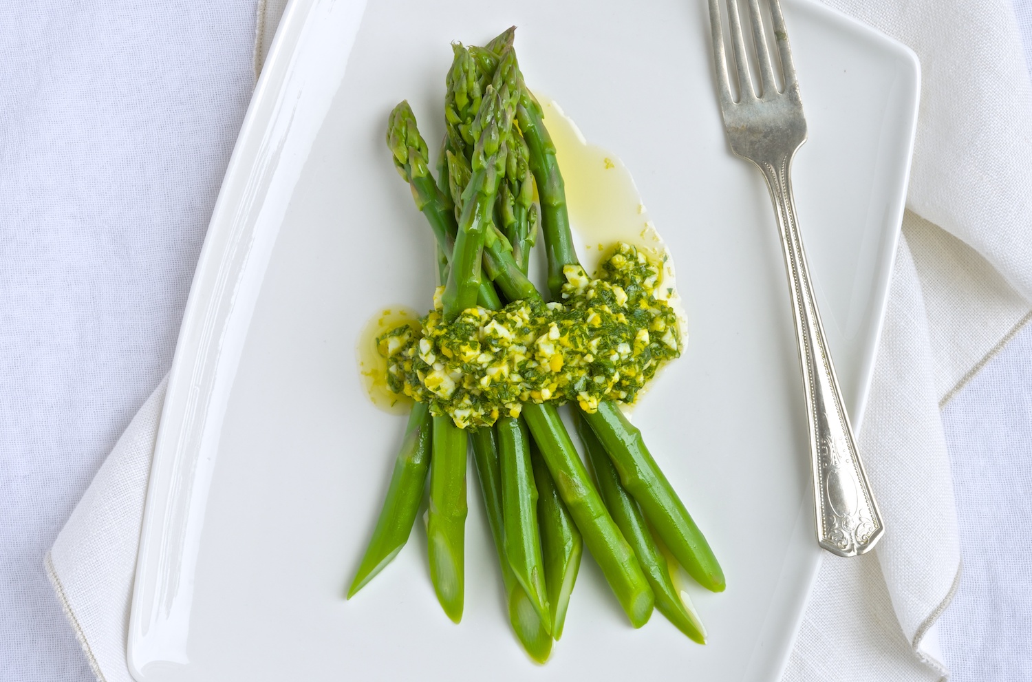 Asparagus with chopped egg gremolata recipe by Chef Abby Carlson.