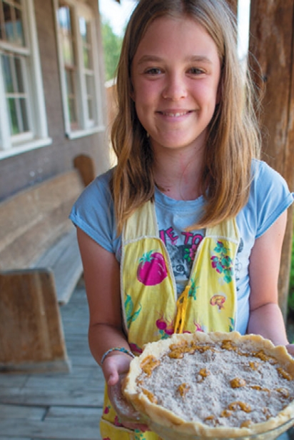 Girl holding a pie